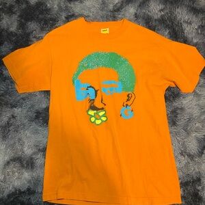 Orange Graphic T-Shirt with Blue and Green Design